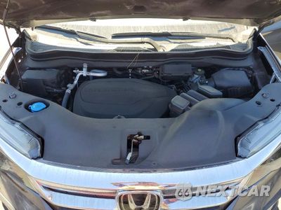 Zdjęcie 12 z 13 samochodu: 2021 HONDA PILOT EX VIN:5FNYF5H37MB041035 - miniatura