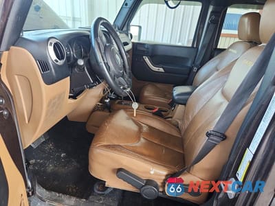 Zdjęcie 7 z 13 samochodu: 2013 JEEP WRANGLER UNLIMITED SAHARA VIN:1C4BJWEGXDL687930 - miniatura