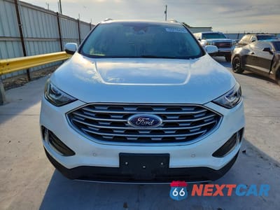 Piąte zdjęcie samochodu w środku: 2020 FORD EDGE TITANIUM VIN:2FMPK3K91LBB19342 - miniatura