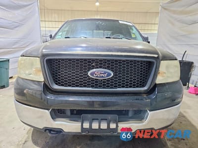 Piąte zdjęcie samochodu w środku: 2005 FORD F150 VIN:1FTPW14575FA77106 - miniatura