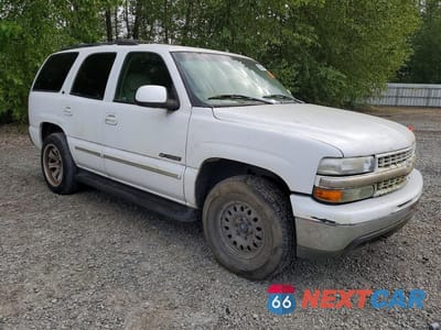 Czwarte zdjęcie samochodu z boku: 2001 CHEVROLET TAHOE K1500 VIN:1GNEK13TX1J234855 - miniatura