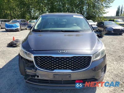 Piąte zdjęcie samochodu w środku: 2015 KIA SEDONA LX VIN:KNDMB5C12F6029888 - miniatura