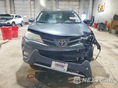 Piąte zdjęcie samochodu w środku: 2014 TOYOTA RAV4 XLE VIN:JTMRFREVXED050581 - miniatura