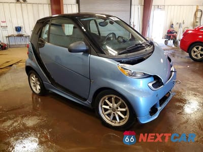 Czwarte zdjęcie samochodu z boku: 2014 SMART FORTWO VIN:WMEEJ9AA6EK774961 - miniatura