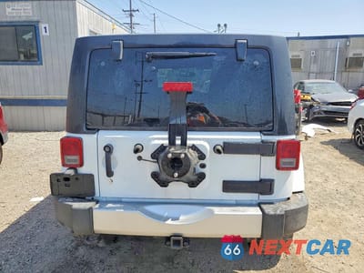 Zdjęcie 6 z 13 samochodu: 2014 JEEP WRANGLER UNLIMITED SAHARA VIN:1C4BJWEG0EL212501 - miniatura