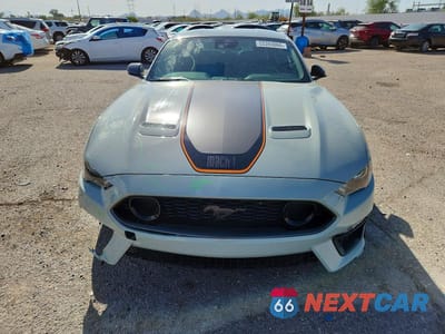 Piąte zdjęcie samochodu w środku: 2022 FORD MUSTANG MACH I VIN:1FA6P8R0XN5552516 - miniatura