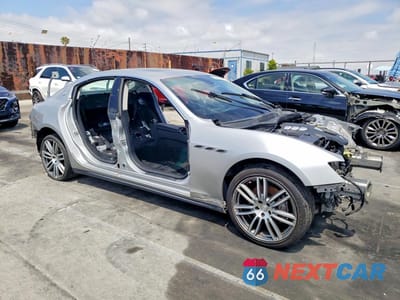Czwarte zdjęcie samochodu z boku: 2016 MASERATI GHIBLI VIN:ZAM57XSAXG1168485 - miniatura