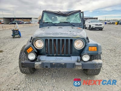 Piąte zdjęcie samochodu w środku: 2004 JEEP WRANGLER / TJ SPORT VIN:1J4FA49S64P747788 - miniatura