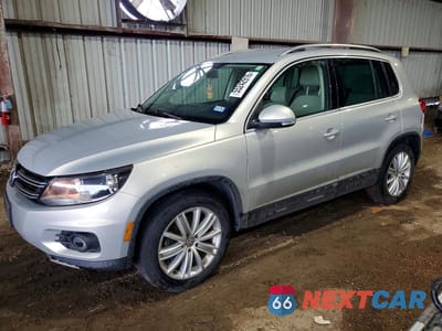2014 VOLKSWAGEN TIGUAN S WVGAV3AX2EW556751 - główne zdjęcie licytacji z USA - miniatura
