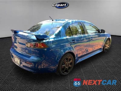 Czwarte zdjęcie samochodu z boku: 2012 MITSUBISHI LANCER ES VIN:JA32U2FUXCU020285 - miniatura