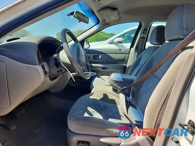 Zdjęcie 7 z 12 samochodu: 2000 FORD TAURUS SES VIN:1FAFP5528YG140741 - miniatura