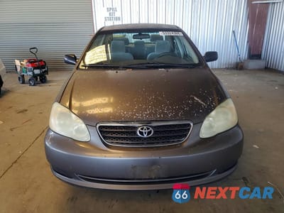 Piąte zdjęcie samochodu w środku: 2005 TOYOTA COROLLA CE VIN:1NXBR32E55Z562139 - miniatura