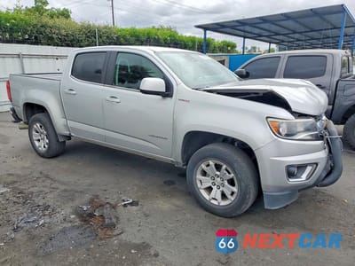 Czwarte zdjęcie samochodu z boku: 2017 CHEVROLET COLORADO LT VIN:1GCGSCE15H1275252 - miniatura
