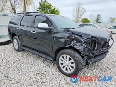 Czwarte zdjęcie samochodu z boku: 2015 TOYOTA SEQUOIA PLATINUM VIN:5TDDY5G12FS113041 - miniatura