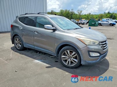 Czwarte zdjęcie samochodu z boku: 2013 HYUNDAI SANTA FE SPORT GL VIN:5XYZU3LA1DG110136 - miniatura