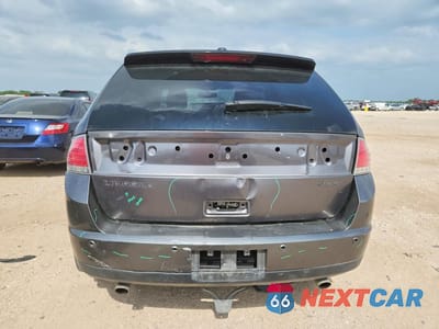 Zdjęcie 6 z 14 samochodu: 2010 LINCOLN MKX VIN:2LMDJ6JC3ABJ23530 - miniatura