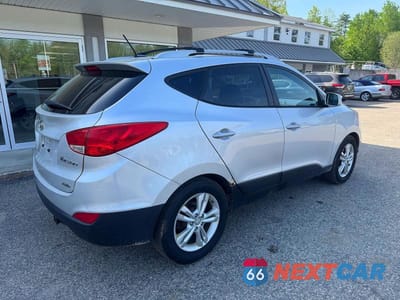 Czwarte zdjęcie samochodu z boku: 2012 HYUNDAI TUCSON GLS VIN:KM8JUCAC4CU395912 - miniatura