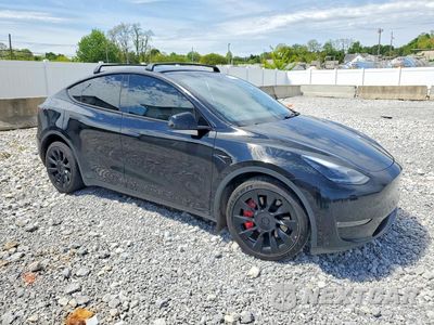 Czwarte zdjęcie samochodu z boku: 2023 TESLA MODEL Y VIN:7SAYGDEE6PA182115 - miniatura