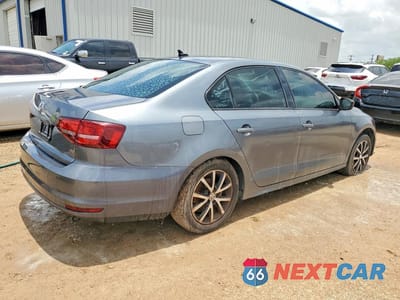 Trzecie zdjęcie samochodu z tyłu: 2016 VOLKSWAGEN JETTA SE VIN:3VWD67AJ3GM232094 - miniatura