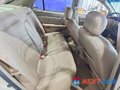 Zdjęcie 10 z 12 samochodu: 2002 BUICK CENTURY LIMITED VIN:2G4WY55J021232621 - miniatura