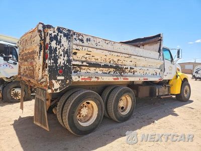 Czwarte zdjęcie samochodu z boku: 1999 STERLING L9511 DUMP TRUCK VIN:2FZNNWDB9XA983025 - miniatura