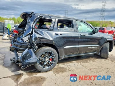 Trzecie zdjęcie samochodu z tyłu: 2016 JEEP GRAND CHEROKEE SRT-8 VIN:1C4RJFDJ6GC301097 - miniatura