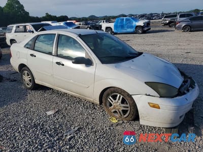 Czwarte zdjęcie samochodu z boku: 2004 FORD FOCUS SE COMFORT VIN:1FAFP34364W174742 - miniatura