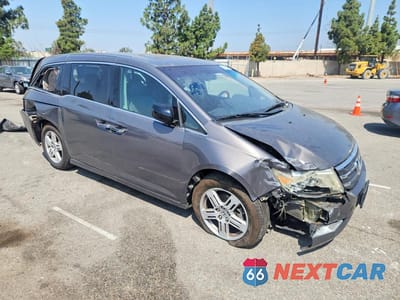 Czwarte zdjęcie samochodu z boku: 2012 HONDA ODYSSEY TOURING VIN:5FNRL5H92CB136277 - miniatura