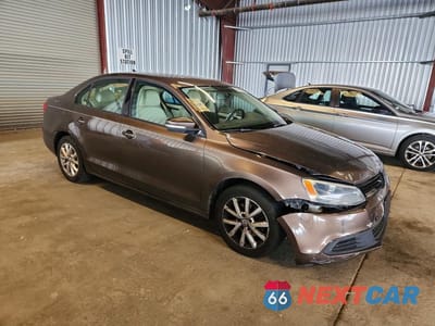 Czwarte zdjęcie samochodu z boku: 2011 VOLKSWAGEN JETTA SE VIN:3VWDZ7AJ3BM349142 - miniatura