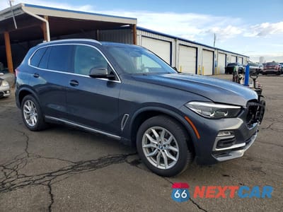 Czwarte zdjęcie samochodu z boku: 2021 BMW X5 XDRIVE40I VIN:5UXCR6C07M9H41914 - miniatura