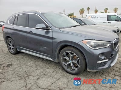 Czwarte zdjęcie samochodu z boku: 2017 BMW X1 XDRIVE28I VIN:WBXHT3C36H5F84264 - miniatura