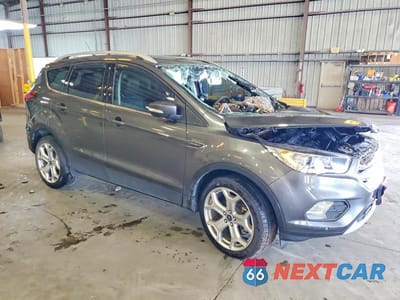 Czwarte zdjęcie samochodu z boku: 2019 FORD ESCAPE TITANIUM VIN:1FMCU0J90KUA90594 - miniatura