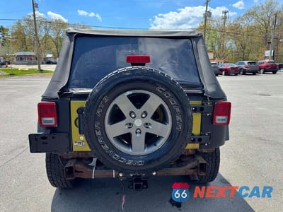 Zdjęcie 8 z 11 samochodu: 2010 JEEP WRANGLER SPORT VIN:1J4AA2D16AL201301 - miniatura