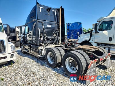 Trzecie zdjęcie samochodu z tyłu: 2012 VOLVO VN VNL VIN:4V4NC9EH6CN534552 - miniatura