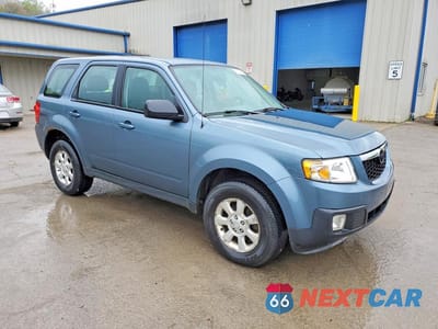 Czwarte zdjęcie samochodu z boku: 2011 MAZDA TRIBUTE I VIN:4F2CY9C73BKM00743 - miniatura