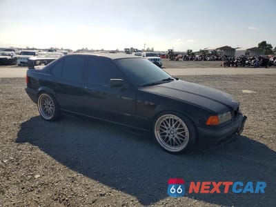 Czwarte zdjęcie samochodu z boku: 1997 BMW 3 SERIES VIN:WBACC0321VEK23589 - miniatura