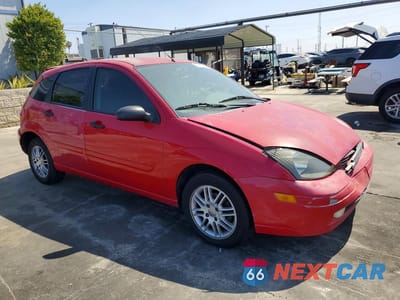 Czwarte zdjęcie samochodu z boku: 2003 FORD FOCUS ZX5 VIN:3FAFP37Z13R191398 - miniatura