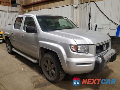 Czwarte zdjęcie samochodu z boku: 2008 HONDA RIDGELINE RTX VIN:2HJYK16338H527019 - miniatura