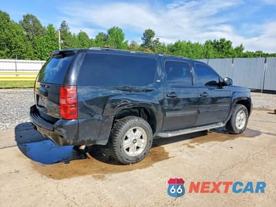 Trzecie zdjęcie samochodu z tyłu: 2012 CHEVROLET SUBURBAN K1500 LT VIN:1GNSKJE78CR302741 - miniatura