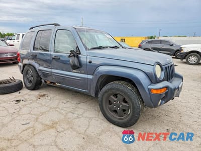 Czwarte zdjęcie samochodu z boku: 2002 JEEP LIBERTY LIMITED 4WD VIN:1J8GL58K92W186087 - miniatura
