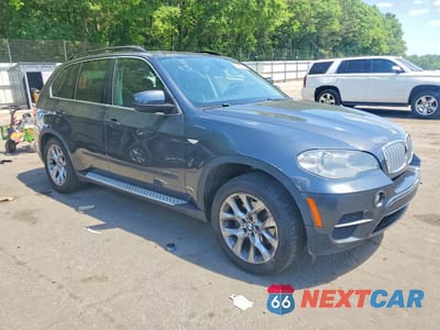 Czwarte zdjęcie samochodu z boku: 2013 BMW X5 XDRIVE35I VIN:5UXZV4C54D0E03039 - miniatura