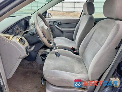 Zdjęcie 7 z 13 samochodu: 2002 FORD FOCUS SE VIN:1FAFP36382W220789 - miniatura