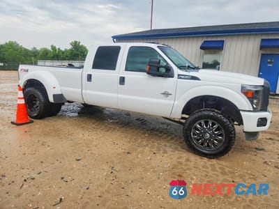 Czwarte zdjęcie samochodu z boku: 2015 FORD F350 SUPER DUTY VIN:1FT8W3DT6FEA49870 - miniatura