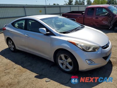 Czwarte zdjęcie samochodu z boku: 2012 HYUNDAI ELANTRA GLS VIN:KMHDH4AE1CU463365 - miniatura