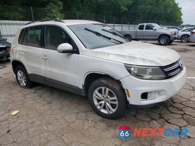 Czwarte zdjęcie samochodu z boku: 2016 VOLKSWAGEN TIGUAN S VIN:WVGAV7AX5GW518991 - miniatura