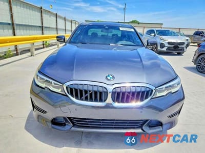 Piąte zdjęcie samochodu w środku: 2021 BMW 330I VIN:3MW5R1J08M8B53203 - miniatura