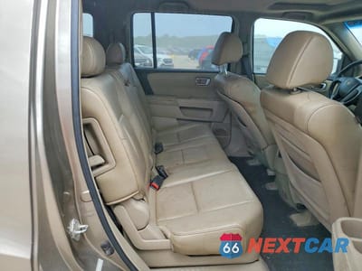 Zdjęcie 11 z 13 samochodu: 2009 HONDA PILOT EXL VIN:5FNYF48549B035454 - miniatura