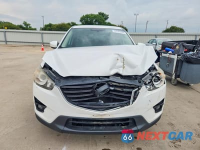 Piąte zdjęcie samochodu w środku: 2016 MAZDA CX-5 TOURING VIN:JM3KE2CY9G0660711 - miniatura