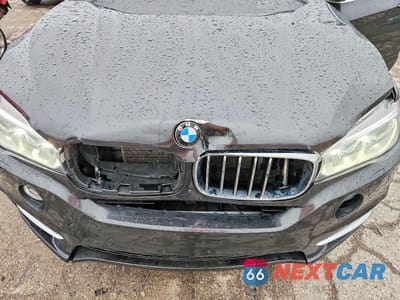 Zdjęcie 12 z 13 samochodu: 2016 BMW X5 XDRIVE35I VIN:5UXKR0C5XG0P30190 - miniatura