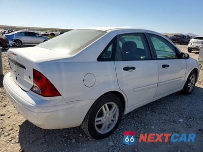Trzecie zdjęcie samochodu z tyłu: 2002 FORD FOCUS VIN:1FAFP34362W154388 - miniatura